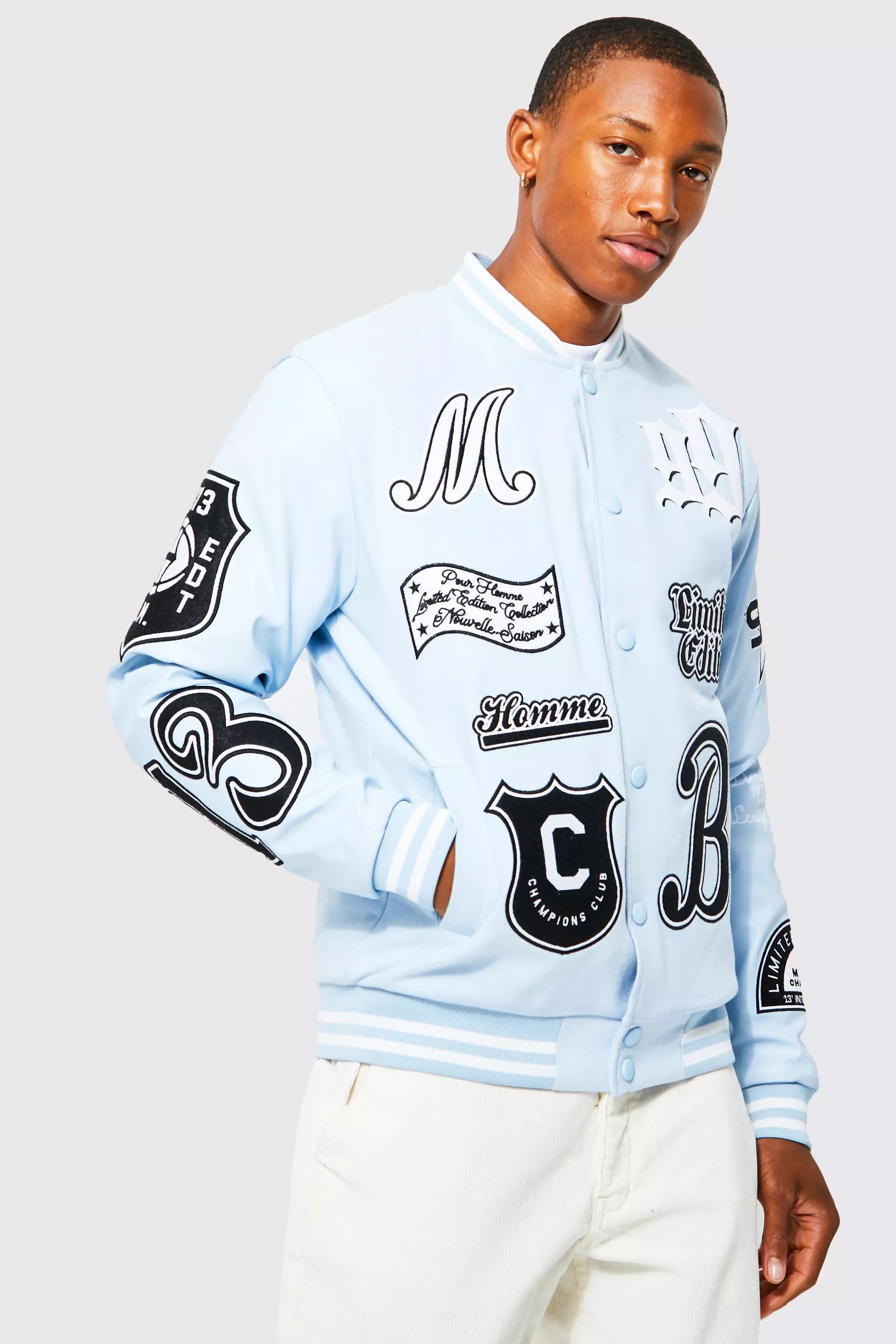 All Over Badged Varsity Jacket | boohooMAN USA